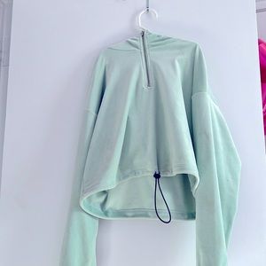 This is a mint green forever 21 cropped hoodie and it is so soft!